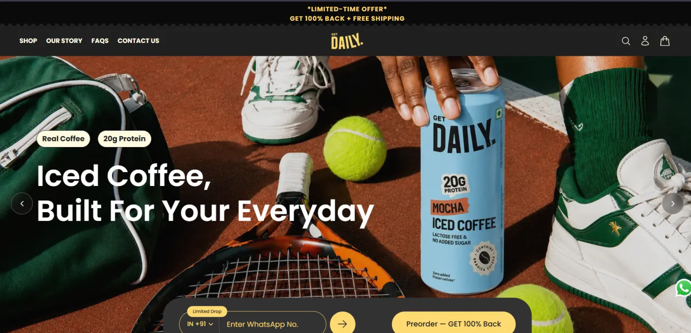 Get Daily home page: a banner with the headline Iced Coffee, Built For Your Everyday, a can of protein iced coffee on a tennis court, a WhatsApp number field and a Preorder button Get Daily home page: a banner with the headline Iced Coffee, Built For Your Everyday, a can of protein iced coffee on a tennis court, a WhatsApp number field and a Preorder button